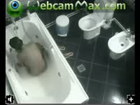 Cute barely of age girl taking a bath without any idea she's being recorded by voyeur cam